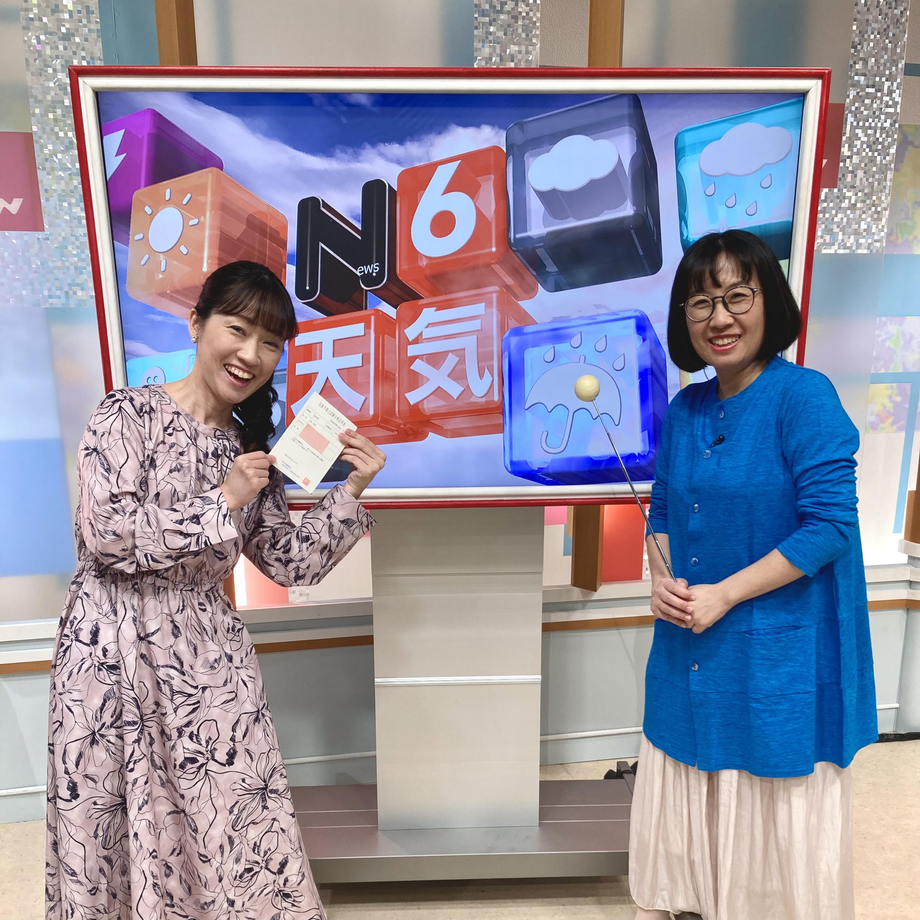 合格通知書を手に井上さんと